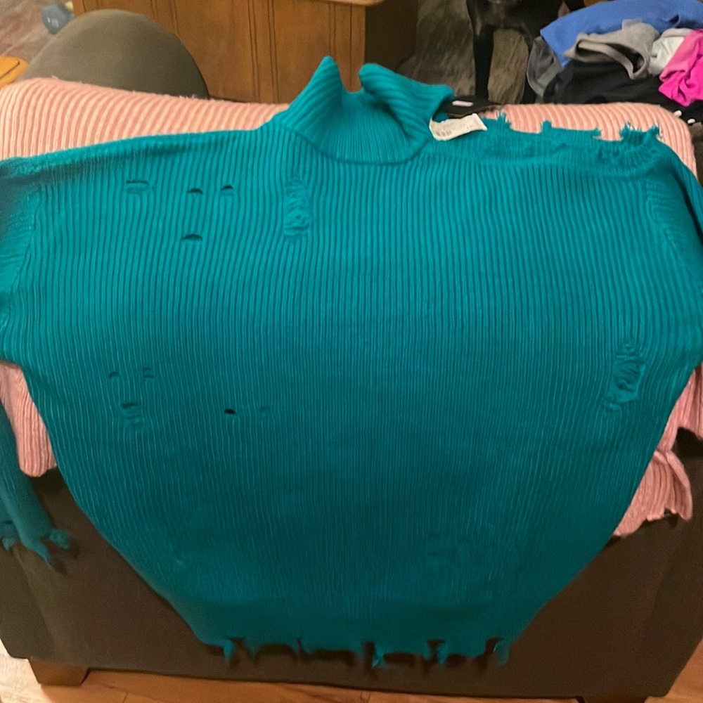Turtle neck open shoulder faux ripped sweater
